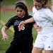 Huron junior Kelsey Trulik battles for possession of a ball during the game against Skyline on Thursday, May 30. Daniel Brenner I AnnArbor.com